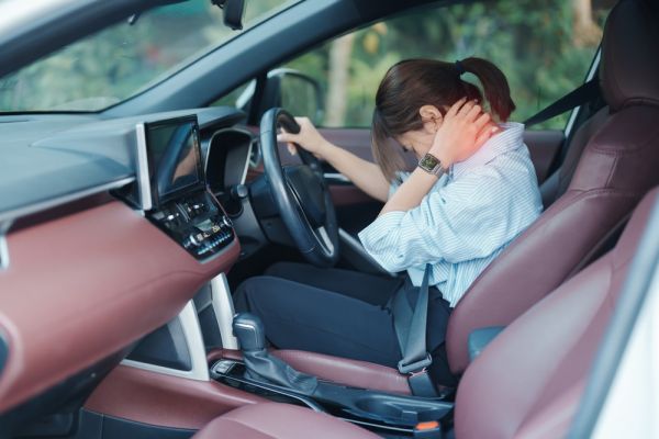 Woman in pain after a car accident - United Personal Injury Care